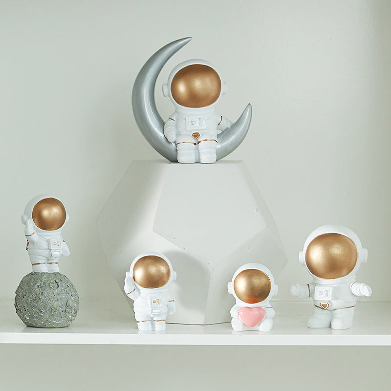 Unleash Cosmic Charm: Elevate Your Living Space with the Astronaut Phone Holder by Toitopi